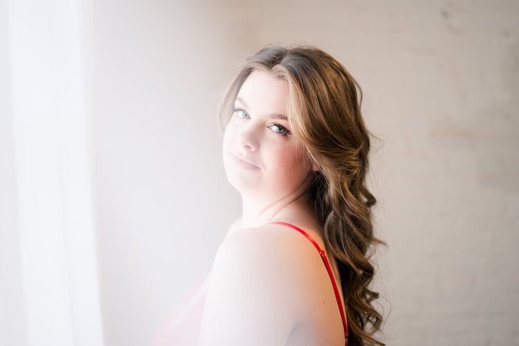 Hazy headshot of boudoir model