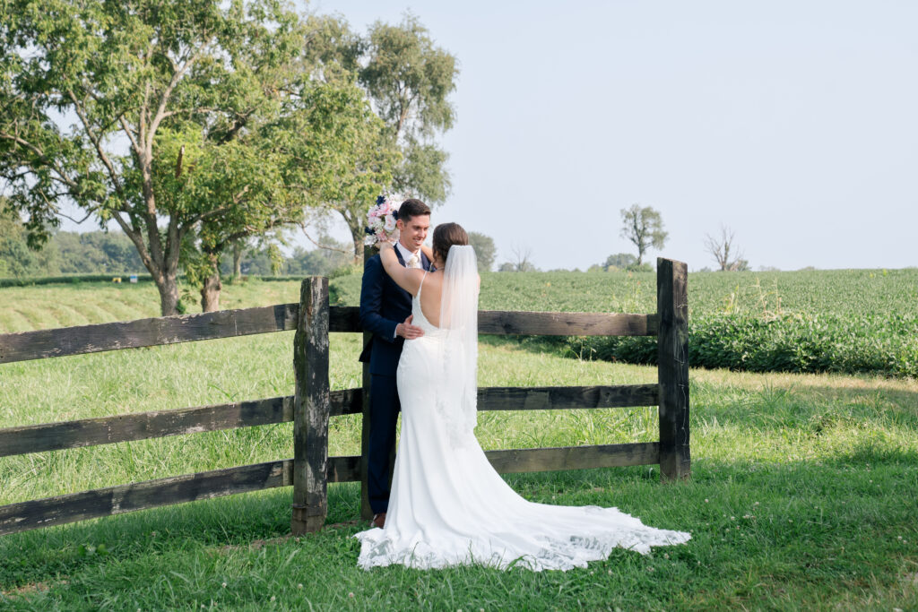 Bride and groom in field Kentucky wedding photography