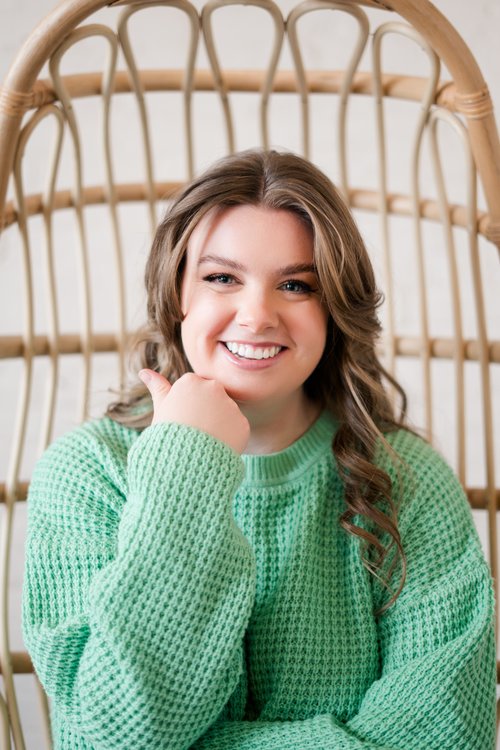 Beauty headshot in green sweater