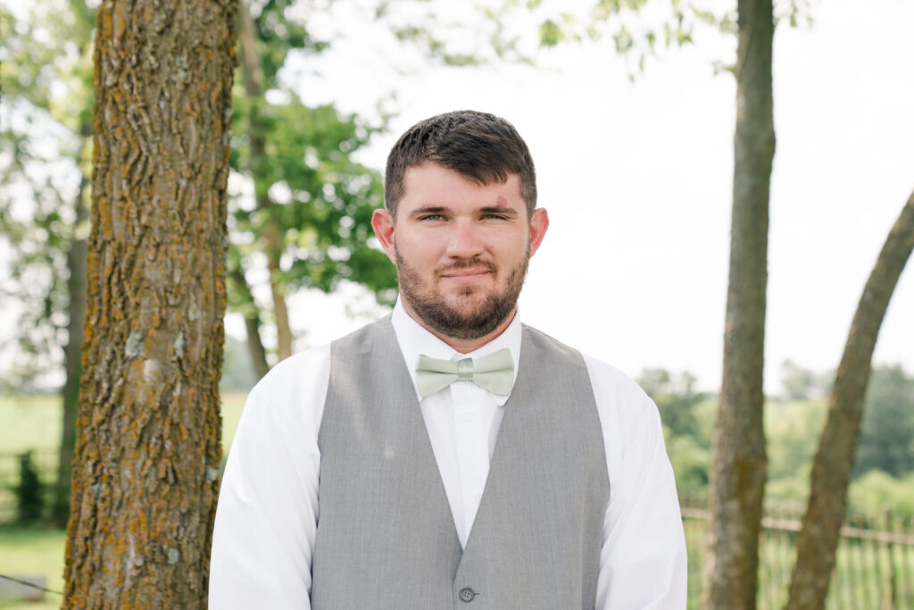 groom headshot summer wedding