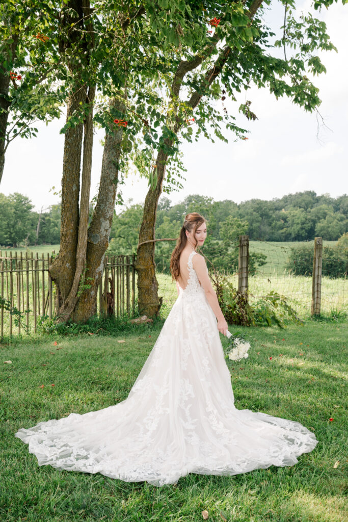 bridal portrait summer wedding in green field