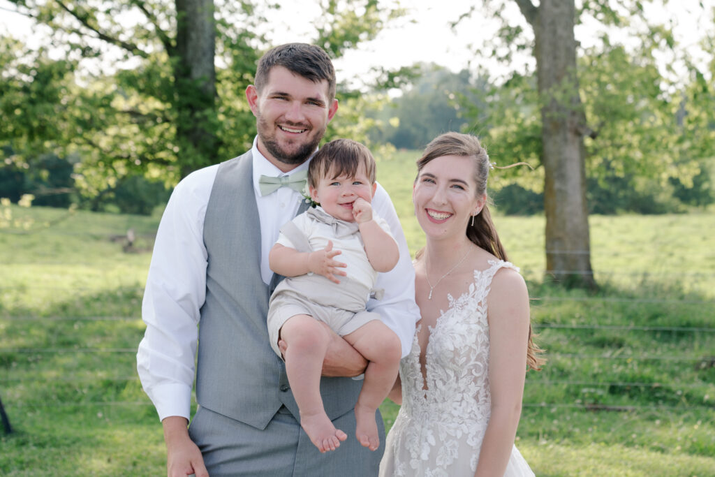 Family Photo of Bride, Groom, and Ring Bearer