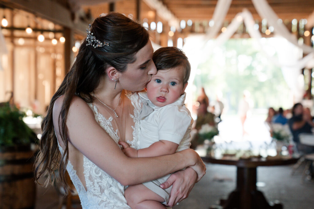 bride dances with her son at wedding