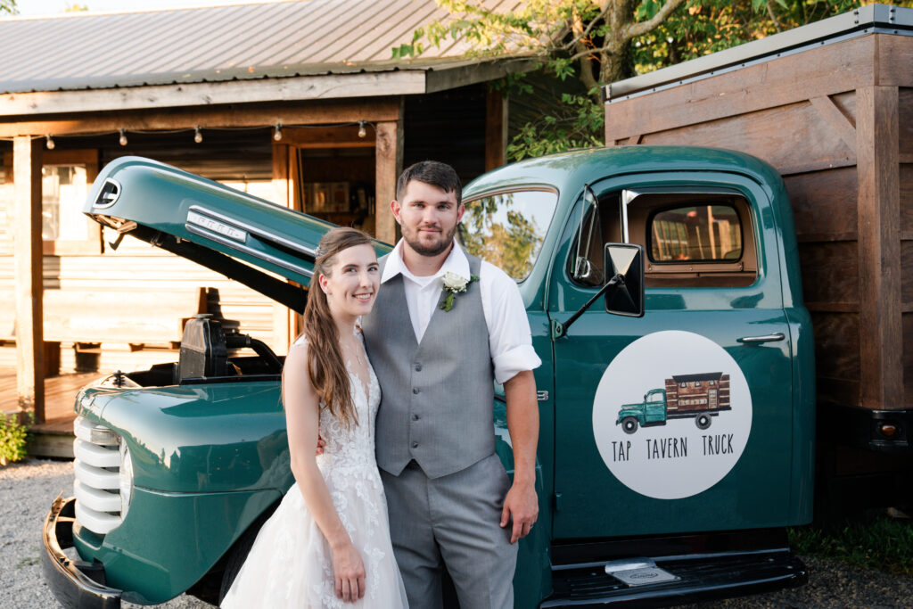 bride and groom with beer truck