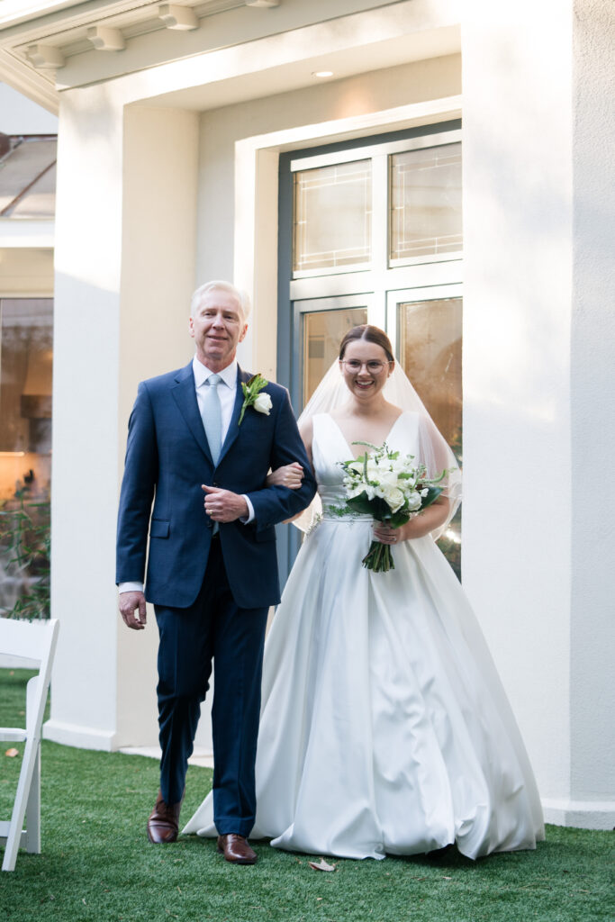 Intimate Backyard Ceremony Bride Walking Down Aisle