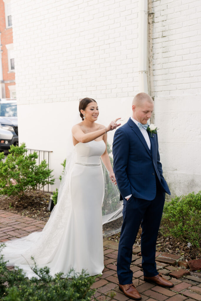 bride and groom first look spring wedding
