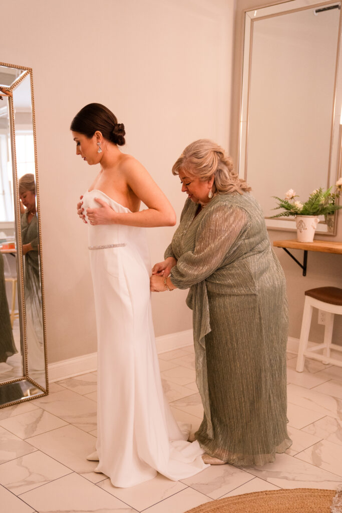 Spring Wedding Bride Getting in Dress
